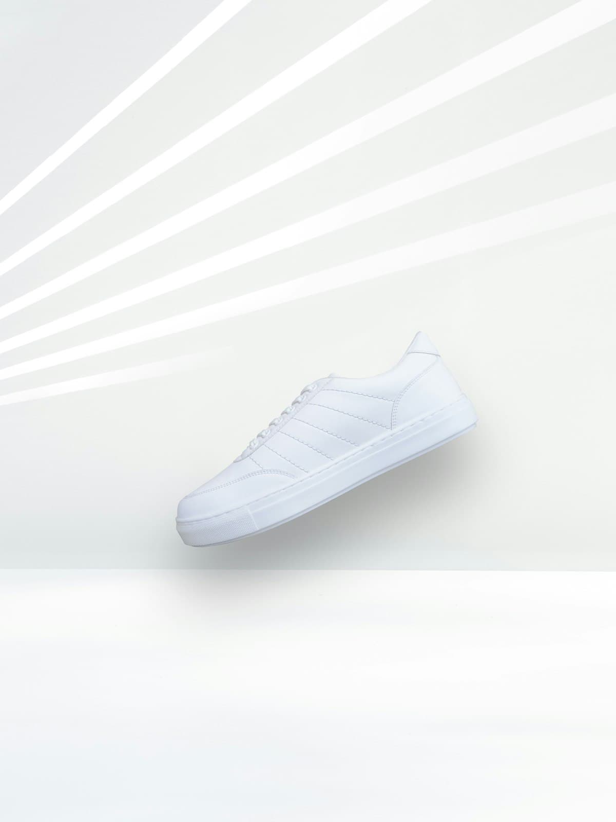 Adidas — Sneakers basse in pelle e suede